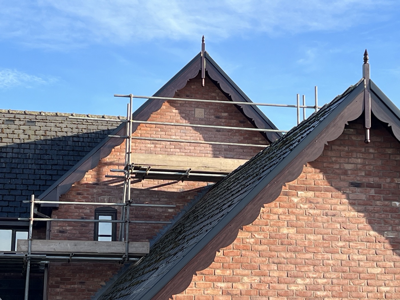 Heritage roofing work on period property with decorative bargeboards — Warwickshire