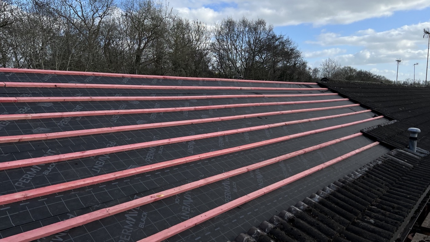 New breathable membrane and battens during roof replacement — Warwickshire